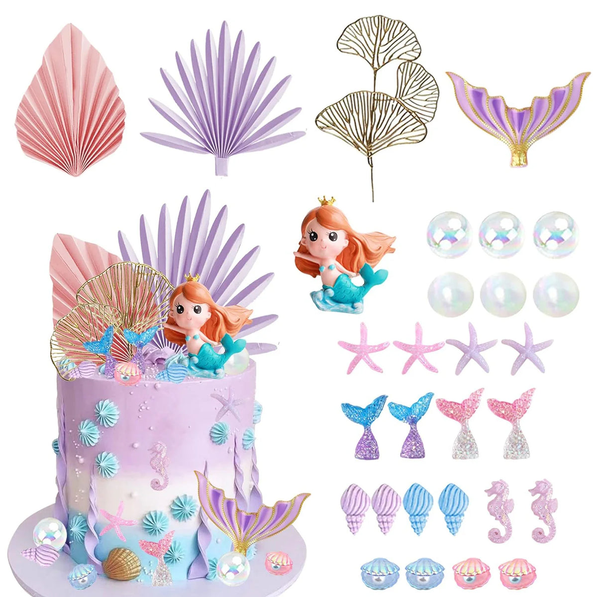 A mermaid-themed cake topper set featuring purple and pink sea elements like fish, starfish, shells, and seaweed.