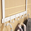 White heavy duty aluminum door hooks mounted on a wooden panel, used for hanging clothes.
