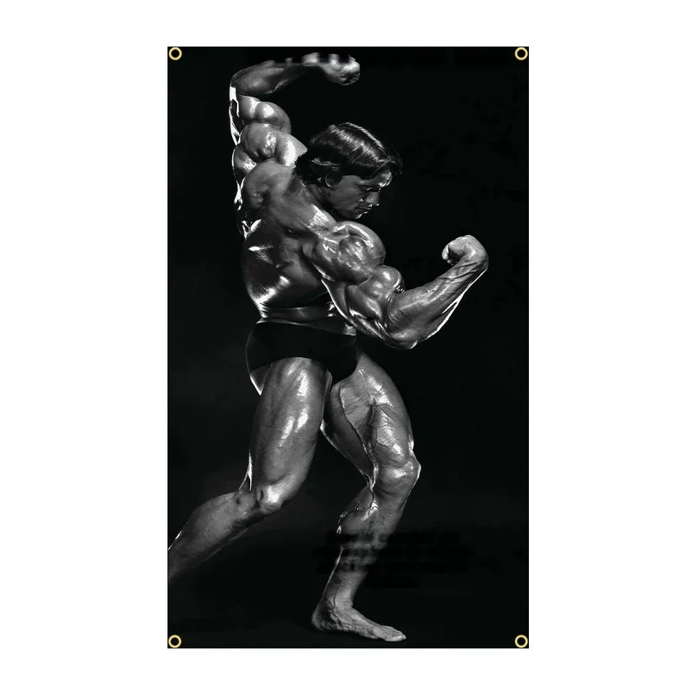 A muscular male bodybuilder posing with a flexed arm, captured in a black and white photograph.