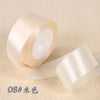 Roll of cream colored silk satin ribbon for gift wrapping and craft projects