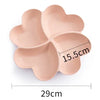 A light pink heart-shaped four-compartment snack tray with dimensions 29cm long and 15.5cm high.