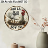 A round rustic wall sign featuring a rooster and text that reads Aquí la de los huevos soy yo