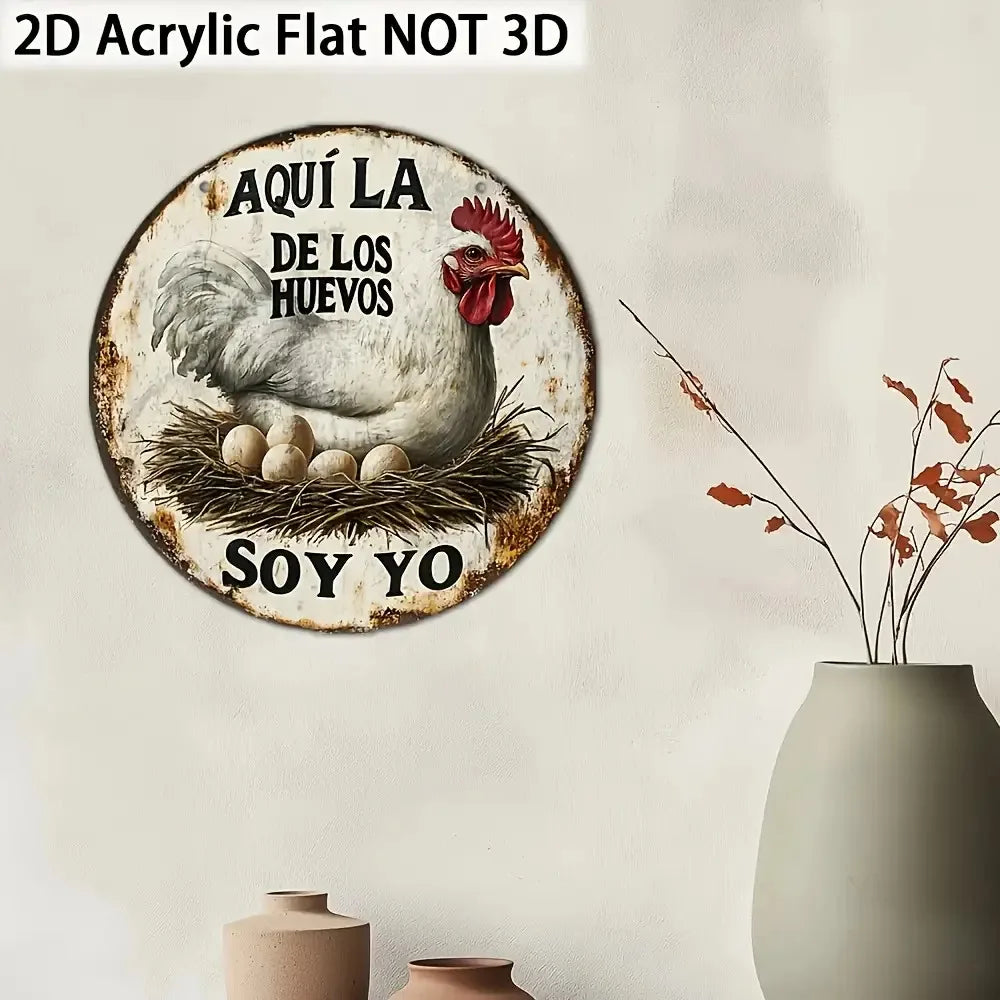 A round rustic wall sign featuring a rooster and text that reads Aquí la de los huevos soy yo