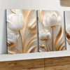 A set of three modern 3D floral canvas wall art pieces featuring white and gold lotus flowers.