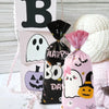 Black and pink Halloween candy treat bags featuring a spooky ghost and pumpkin design