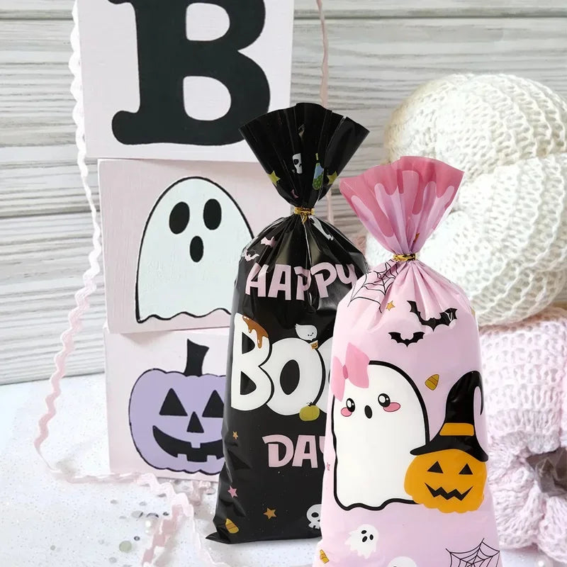 Black and pink Halloween candy treat bags featuring a spooky ghost and pumpkin design