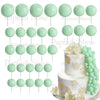 A set of light green foam cake toppers, including round and oval shapes, displayed against a white background.