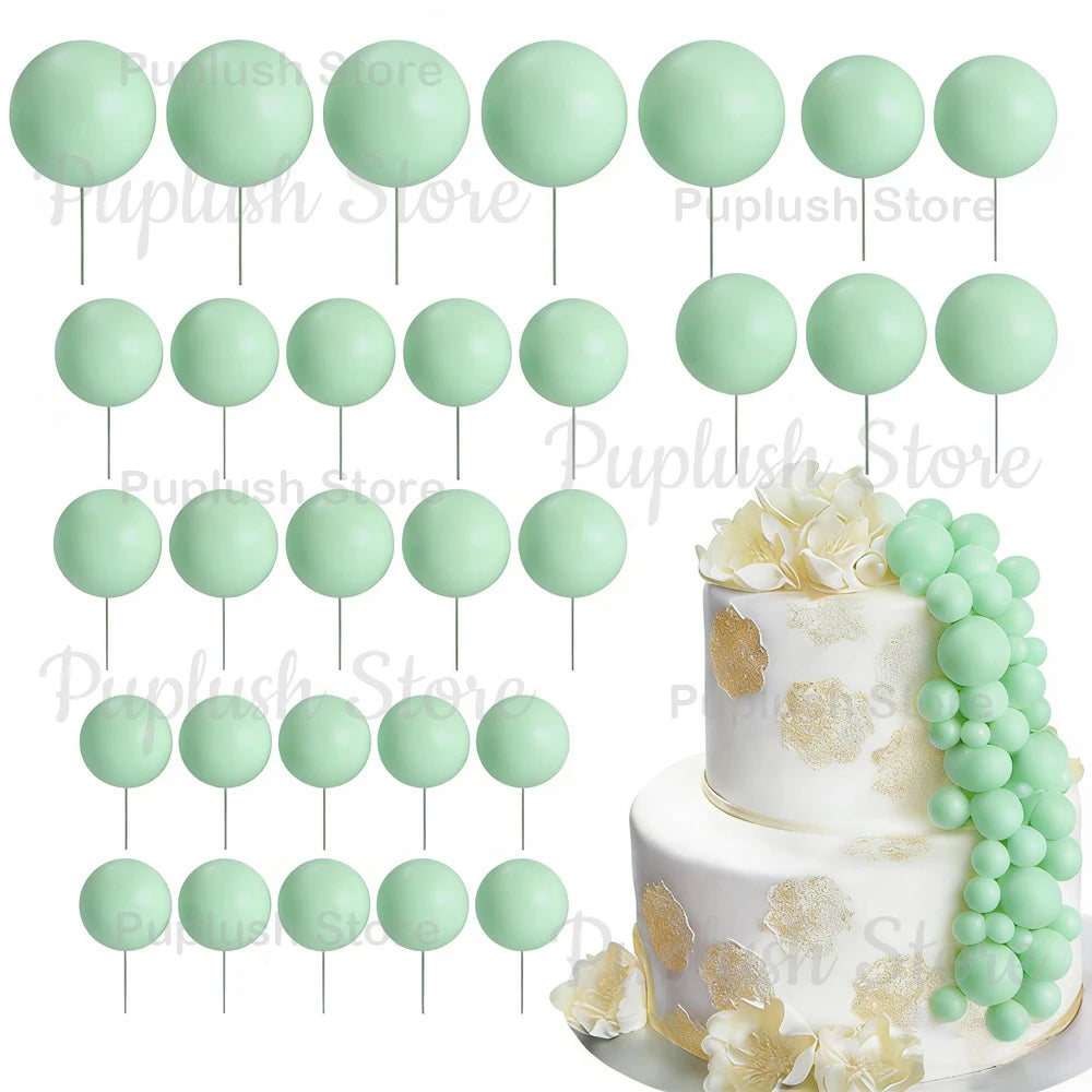 A set of light green foam cake toppers, including round and oval shapes, displayed against a white background.