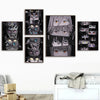 A set of nine framed prints featuring intense eyes from the Demon Slayer anime characters, displayed on a white wall.