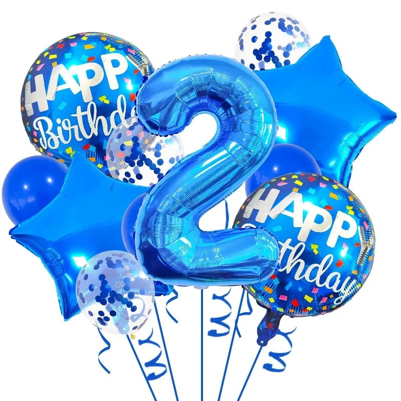 A set of navy and gold foil balloons shaped like the number 2 and a star for a birthday celebration