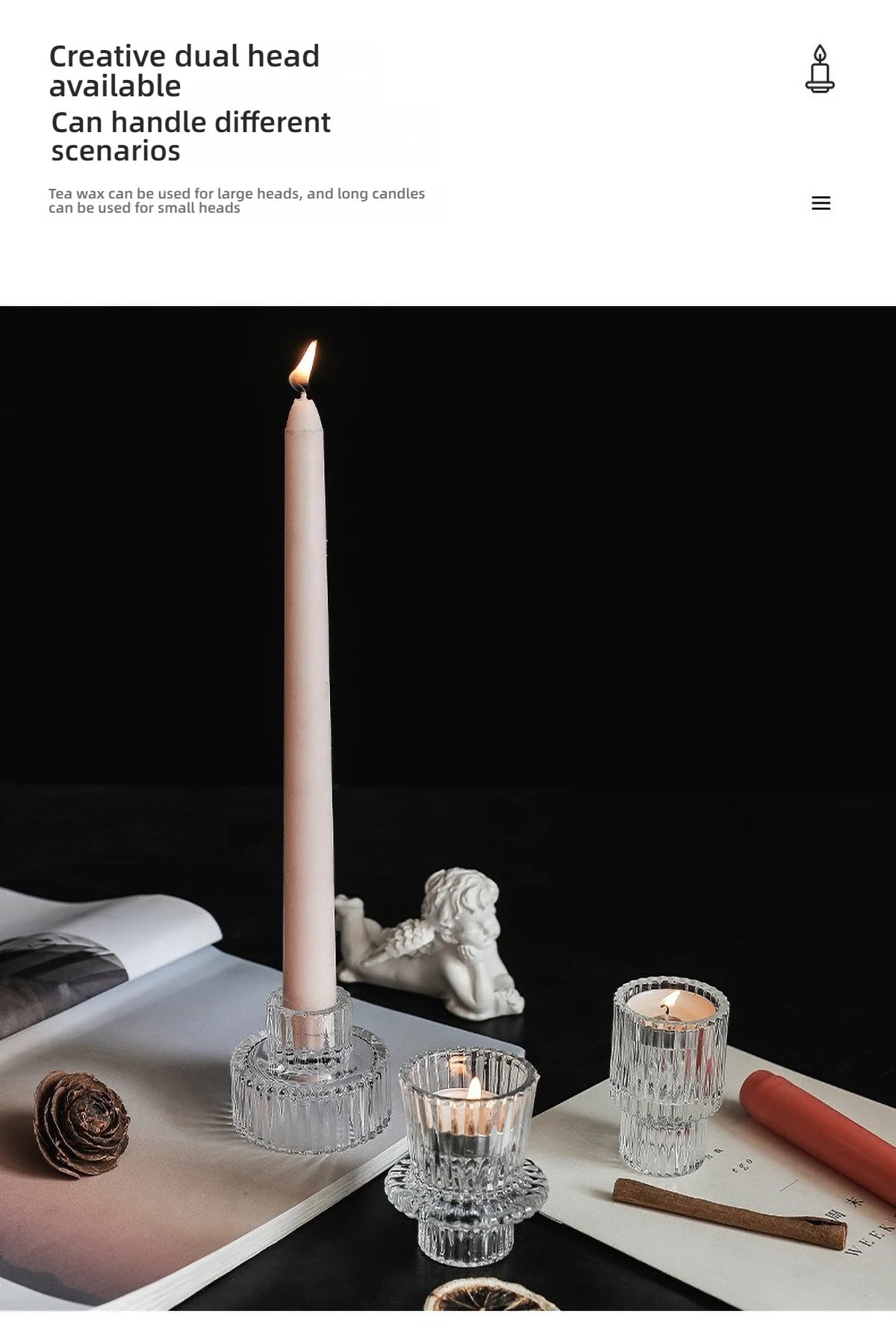 Un alto candelabro de vidrio transparente con una vela de té encendida sobre una superficie blanca.