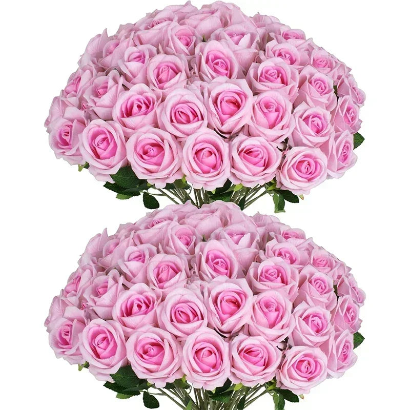 A bouquet of pink artificial silk roses, tightly clustered and arranged in a dome shape.
