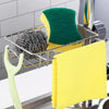 A faucet-mounted kitchen organizer holding a green sponge and a yellow sponge in a metal rack.