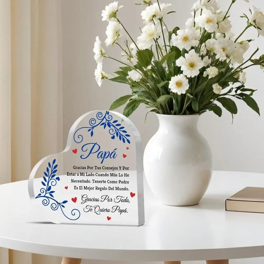 A white acrylic heart plaque with blue floral designs and text thanking a father.