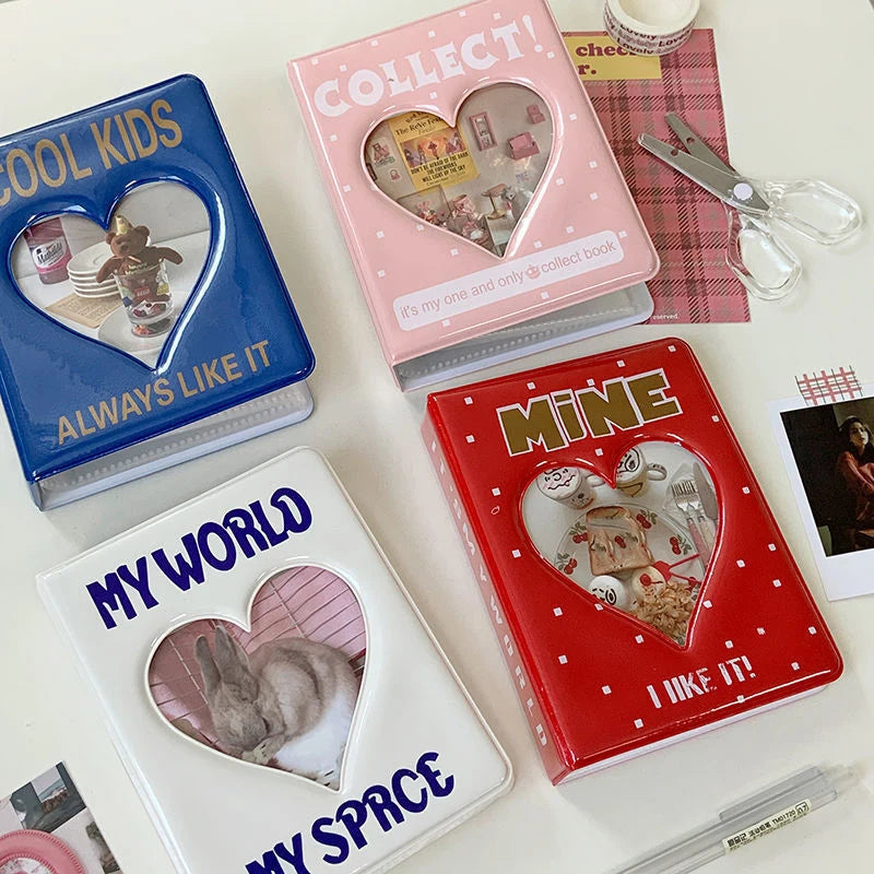 A collection of three photo albums titled Cool Kids, My World, and Mine featuring heart-shaped photo inserts.
