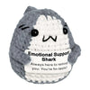 A gray and white hand-woven shark plush pendant with an encouraging card.
