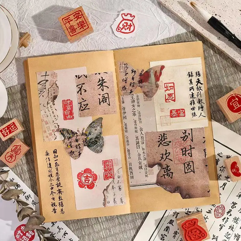 A set of six wooden Chinese character stamps for crafting laid out on a light surface.