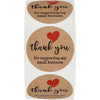 Three round kraft paper thank you stickers with red hearts and text for supporting a small business