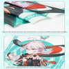 A close-up of a fabric featuring an anime character design with red and black elements.