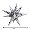 Silver foil balloon shaped like a star with a black cow print pattern for a farm-themed party