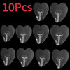 A set of ten transparent self-adhesive hooks with J-shaped grips shown in various angles.