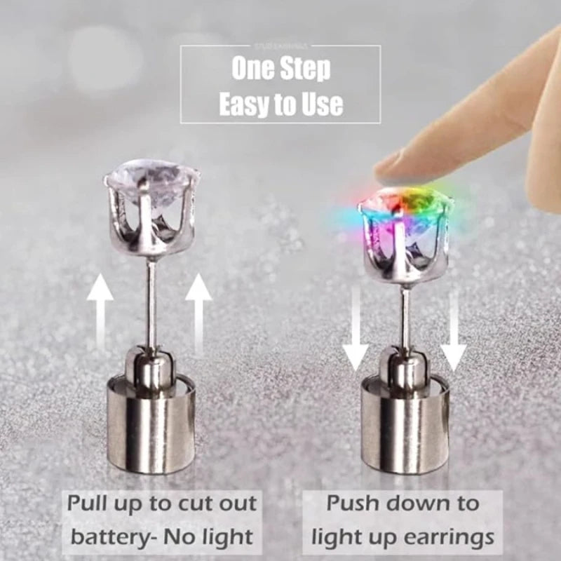 A pair of silver stud earrings with a light-up feature demonstrating the process of turning on the lights.