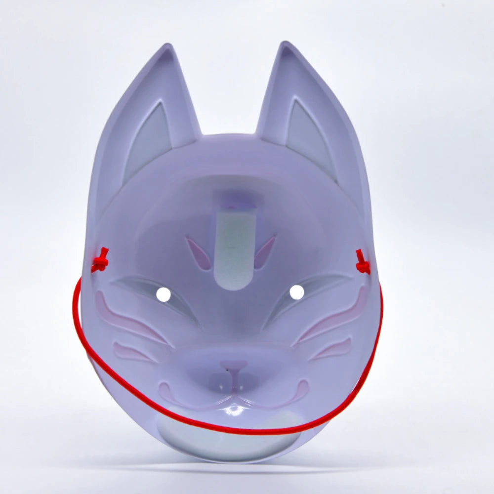 A light purple fox face mask with pointed ears and pink facial features.