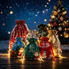 Several reusable drawstring gift bags with snowflake designs are displayed on a wooden surface against a dark, starry backgro
