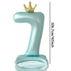 A large, light blue foil number balloon shaped like the number 1, topped with a gold crown.