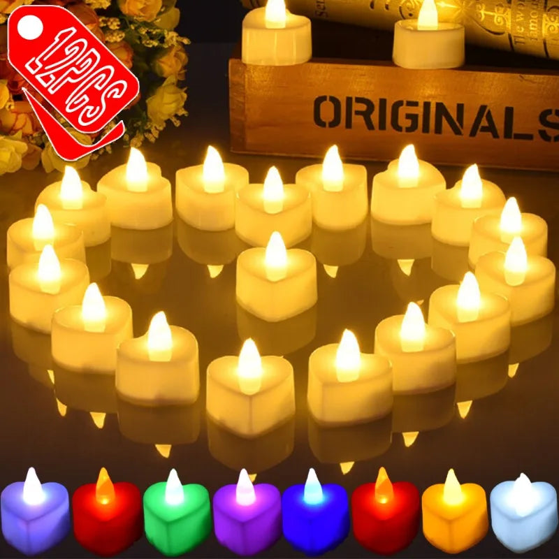 A collection of various colored LED heart-shaped tealight candles arranged on a dark surface.