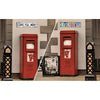 Two vintage red metal street signs with humorous messages are displayed outdoors.