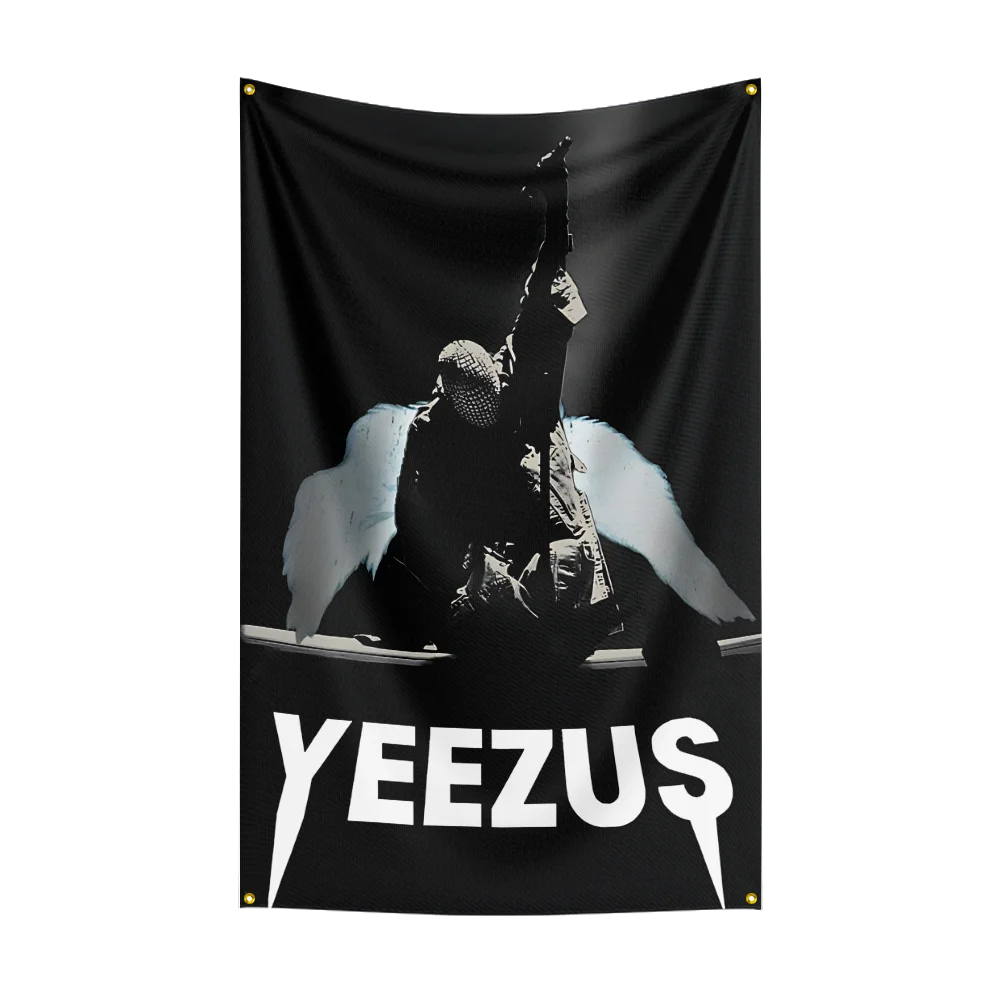 A black fabric tapestry featuring a silhouette of a figure with outstretched arms and the text YEEZUS.
