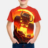 A boy wearing a red t-shirt with a full graphic print of the Monster Jam Grave Digger vehicle engulfed in flames.