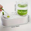 A white self-cleaning watercolor brush rinser with a clear container and a silicone brush