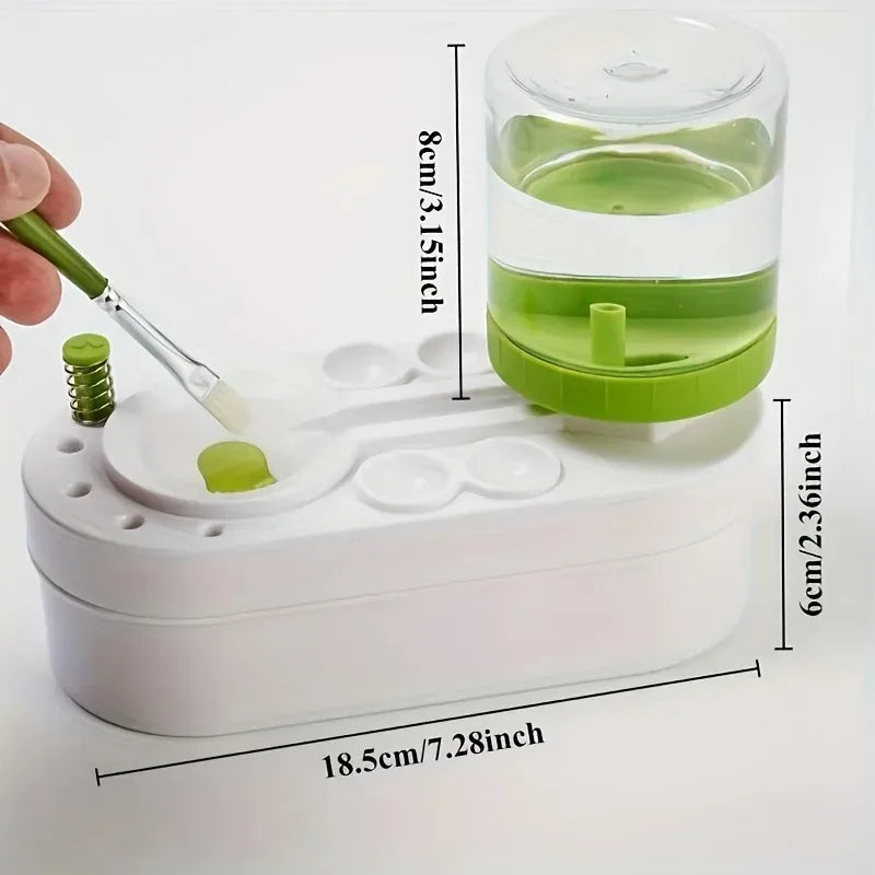 A white self-cleaning watercolor brush rinser with a clear container and a silicone brush