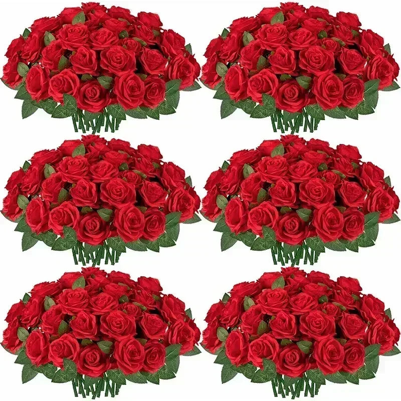 A collection of vibrant red artificial silk rose bouquets arranged for table decor.