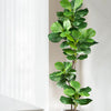 A large artificial ficus tree with green fiddle leaves potted in a gray square planter.