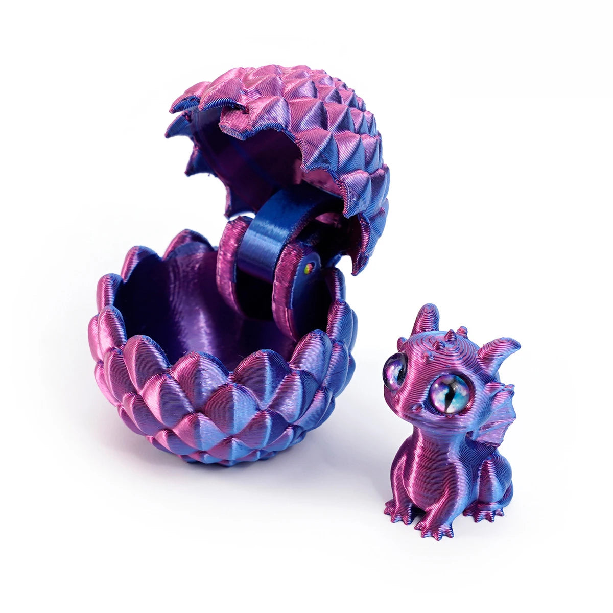 A purple and blue textured dragon egg is cracked open, revealing a small, detailed mini dragon toy.
