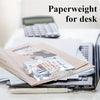 A puzzle-shaped acrylic desk plaque for a Best Mom Ever theme, resting on papers and a laptop.