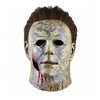 A realistic latex mask of Michael Myers with a bloody scar detail and dark hair.