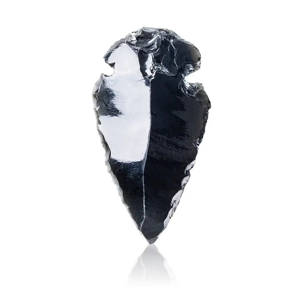 A polished, dark black obsidian arrow pendant with a sharp point and reflective surface.