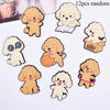 A set of twelve random cute dog-themed fridge magnets featuring soft pastel colors and various poses.