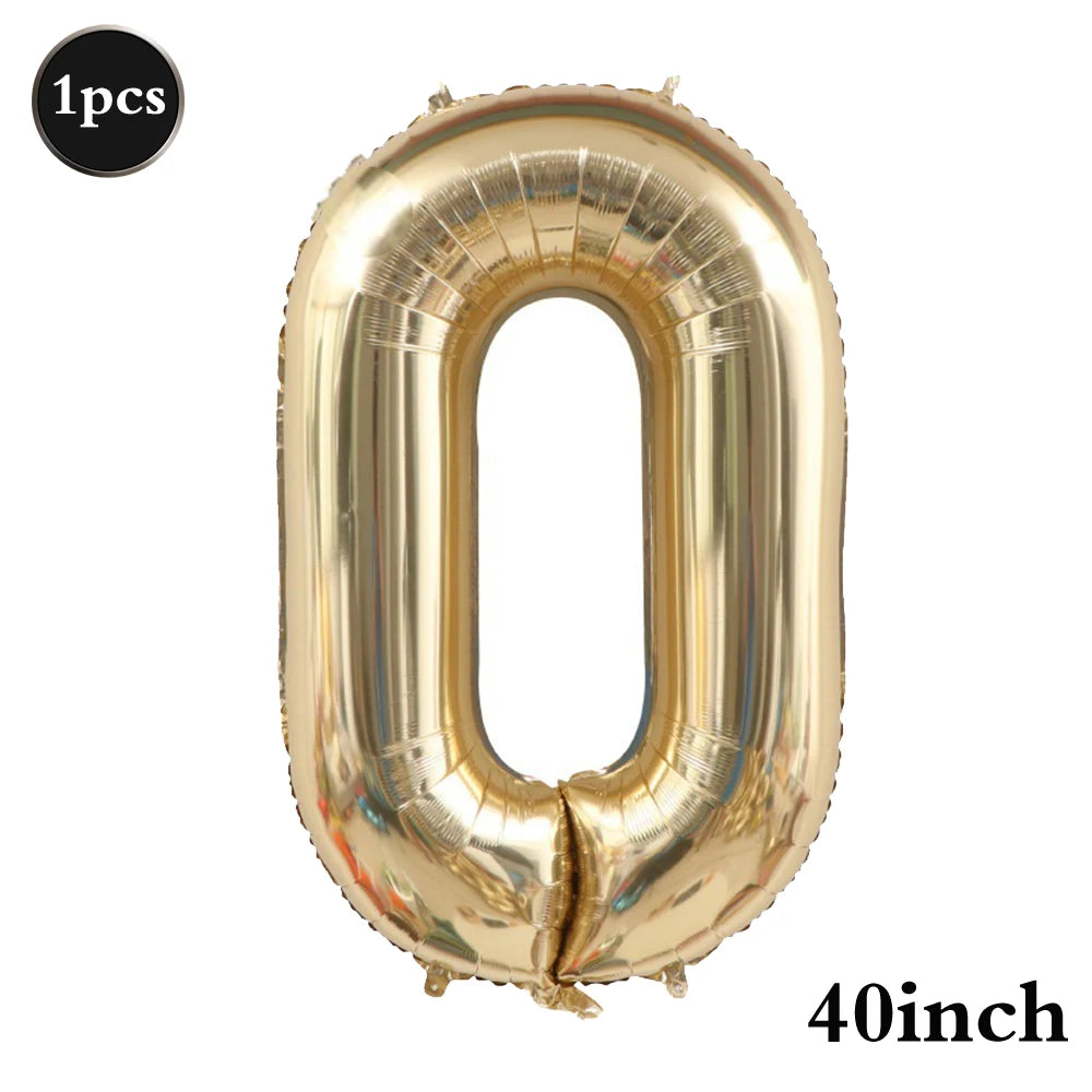 A large gold foil number balloon shaped like the digit zero, measuring 40 inches.
