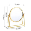 A round, gold-colored metal makeup mirror with a stand, shown with dimensions.