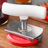 A stainless steel multi-function bottle cap opener with a white handle and red base resting on a wooden surface.