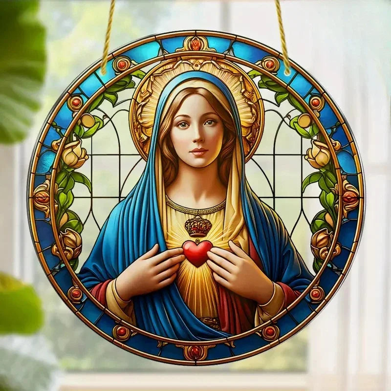 A translucent acrylic Mary suncatcher featuring a depiction of the Virgin Mary with a halo and floral wreath.