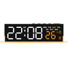 A digital LED alarm clock displaying the time 22:08 and temperature 26 degrees with a seven-day forecast.