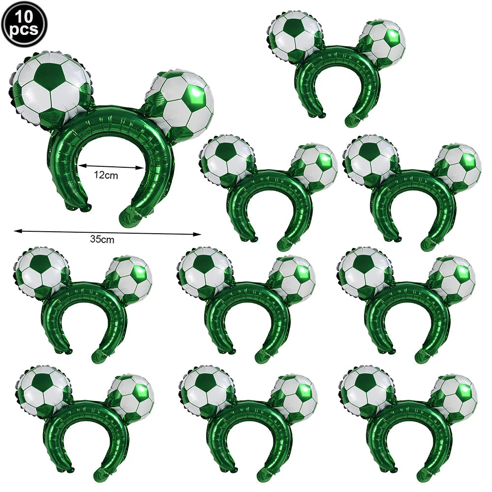 A pack of ten green and white soccer ball balloons with green rings used for party decorations.