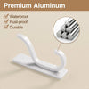 White premium aluminum self-adhesive wall hooks in a set of four mounted on a light-colored wall.