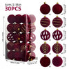 A set of 30 velvet Christmas baubles in deep burgundy and gold accents, packaged for holiday decor.